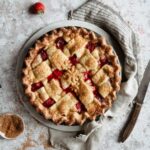 This post will teach you how to make a baked strawberry pie from scratch