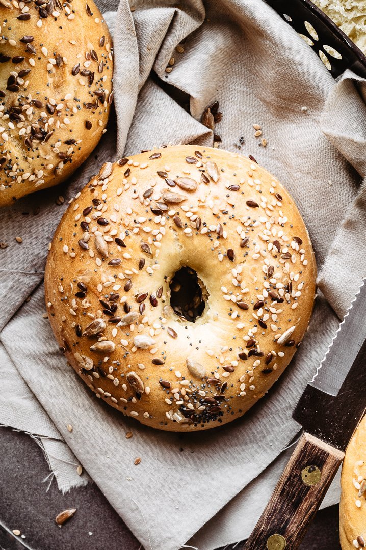 My traditional bagel recipe: single bagel with seeds on top, on a napkin