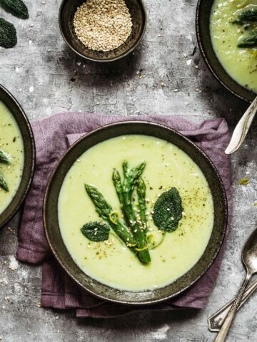 An easy asparagus soup recipe for you: soup into a ceramic bowl