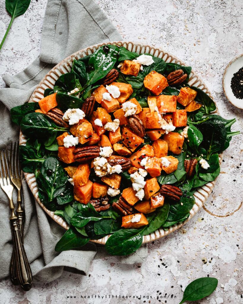 Closeup of spinach goat cheese salad