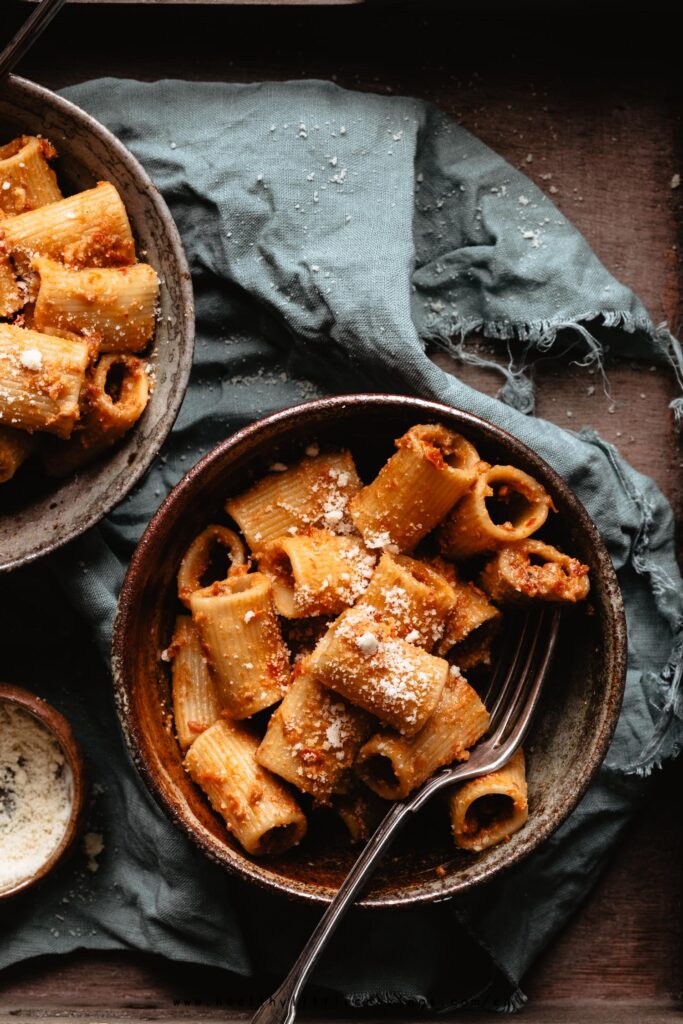 Sun dried tomato pesto pasta into a bowl