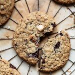A single chewy choc chip cookie with hazelnuts and oats