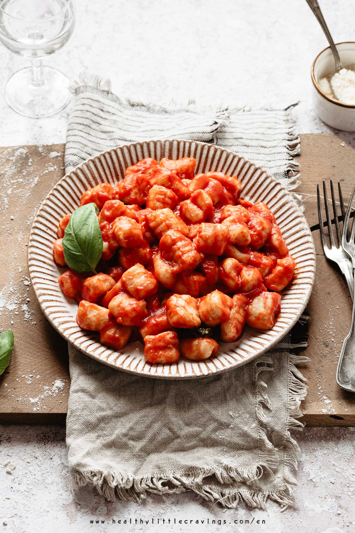 Backlight shot of vegan gnocchi with tomato