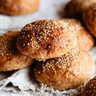 Whole wheat hamburger buns easy recipe using Tangzhong method. Buns with sesame seeds on top