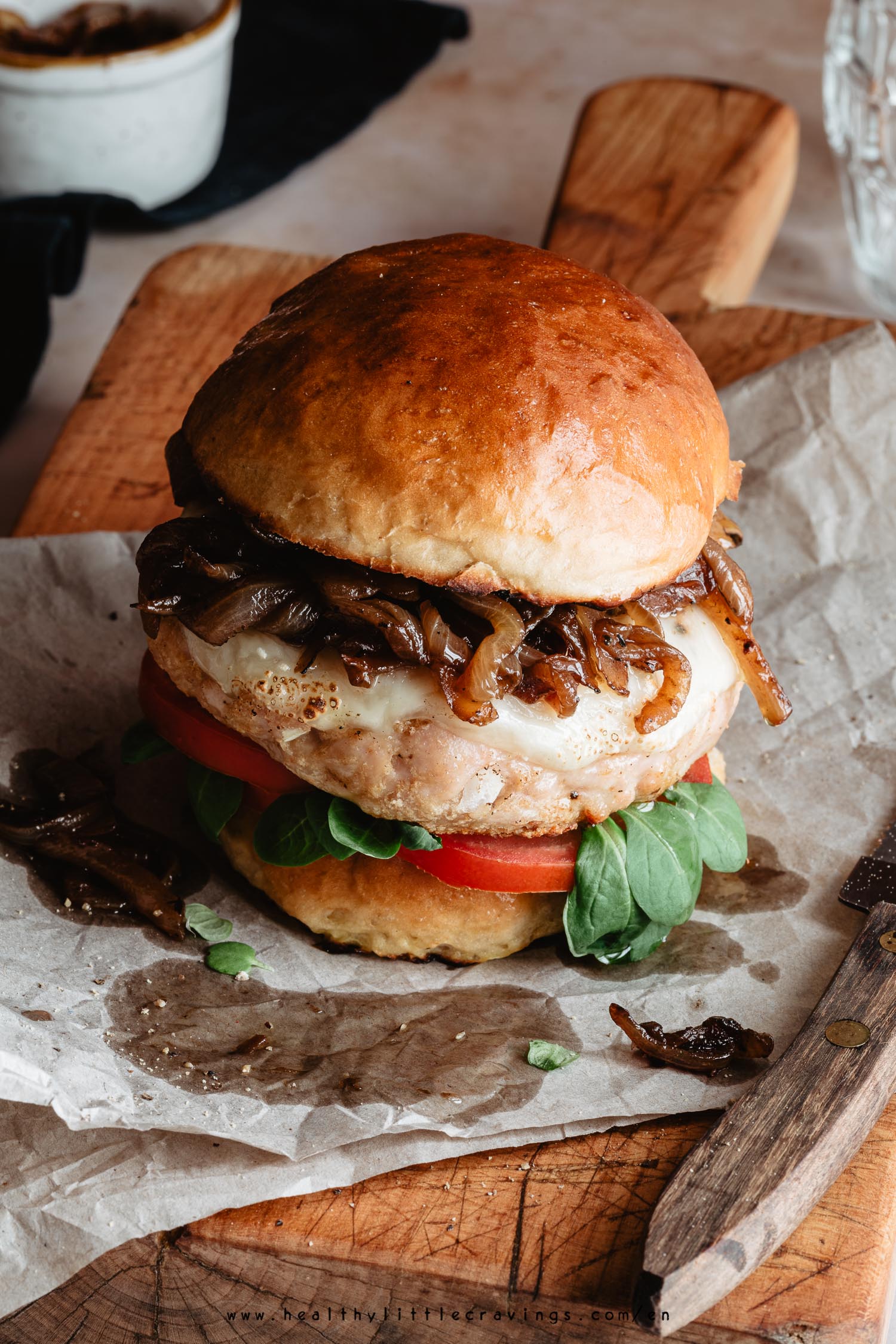 Grilled turkey burgers on a cutting board