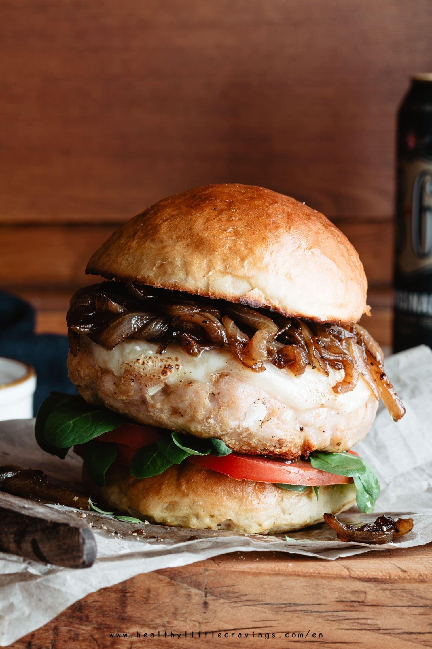 Healthy grilled turkey burger with  caramelized onions