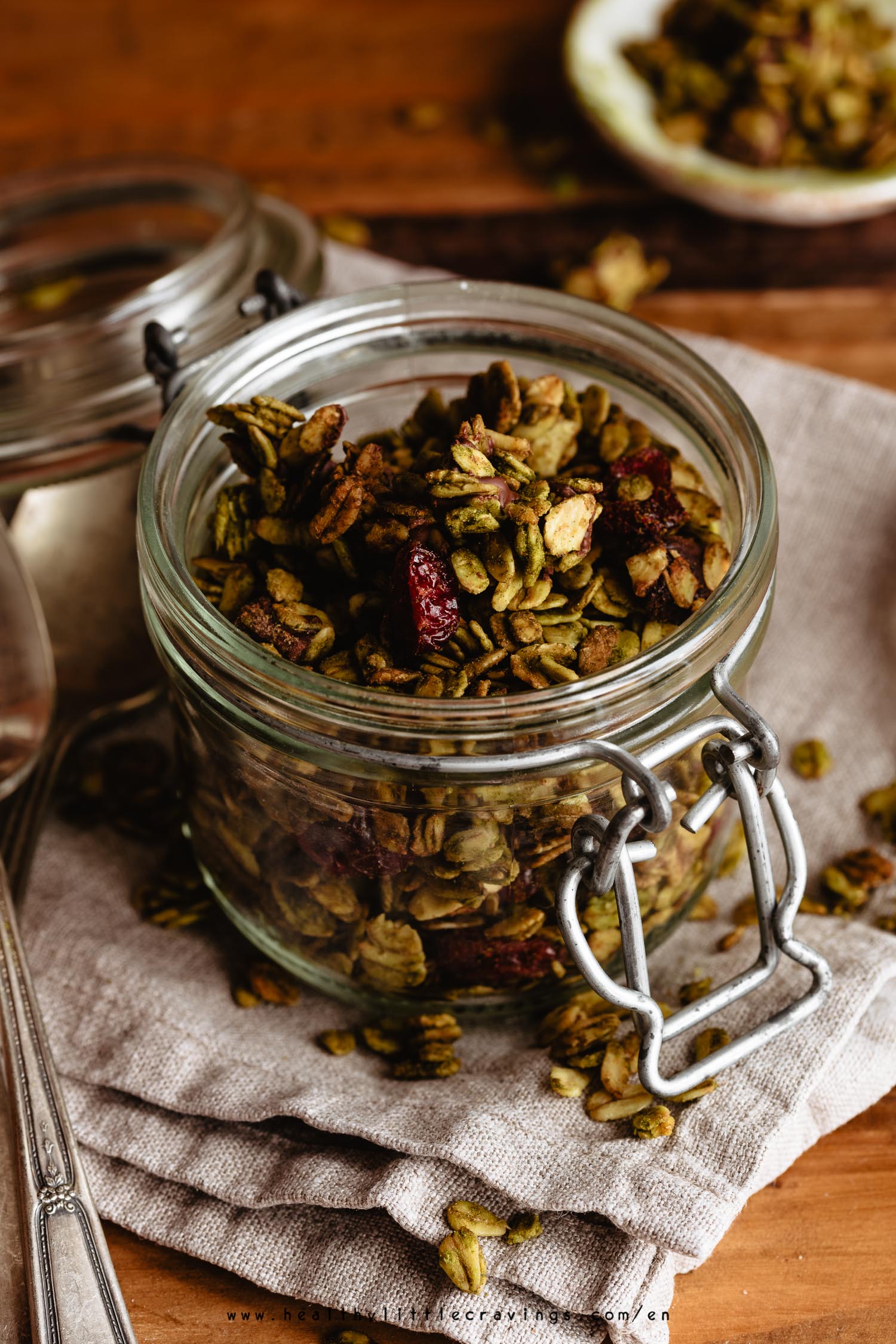 Matcha granola into a jar