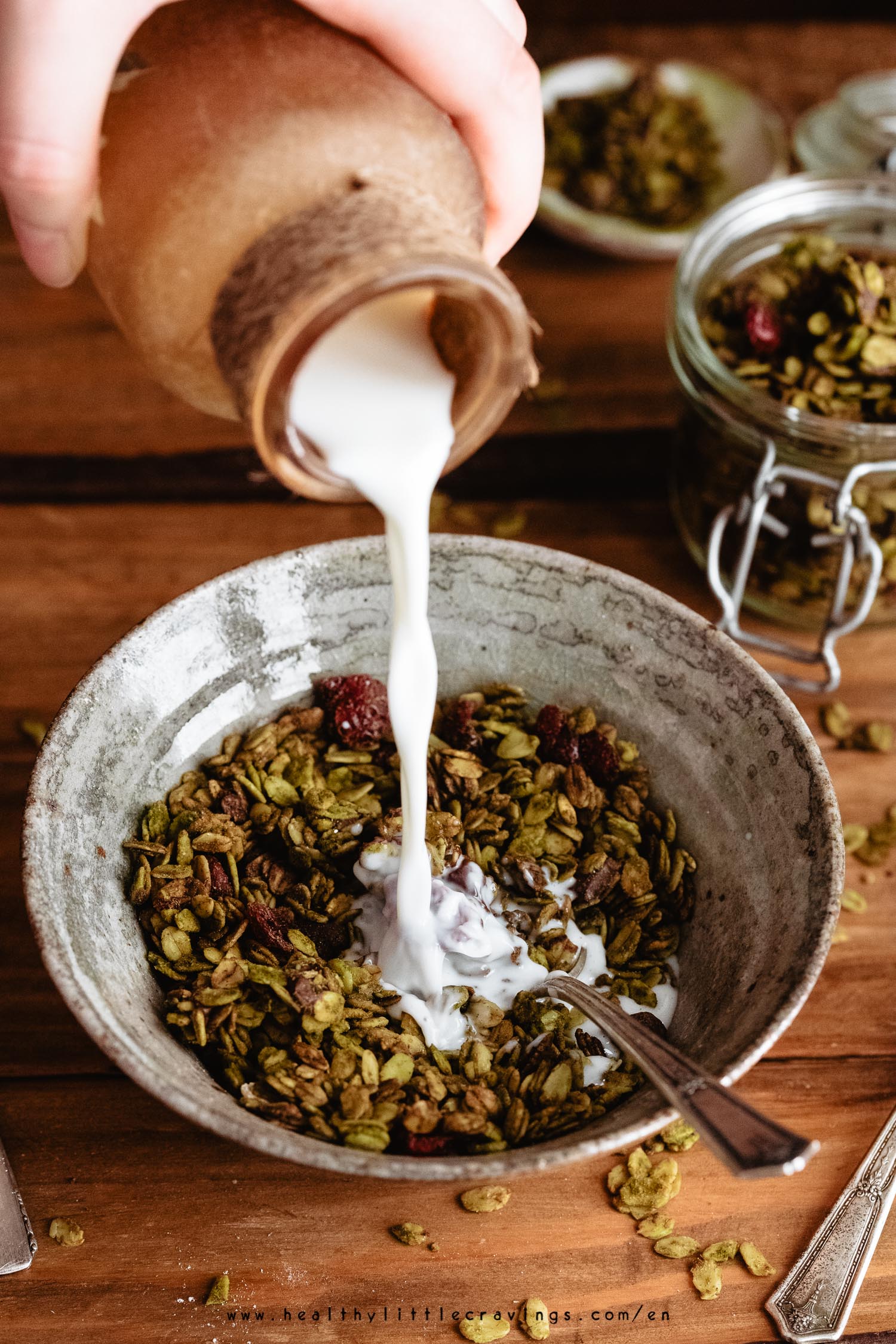 Pouring milk on granola photography