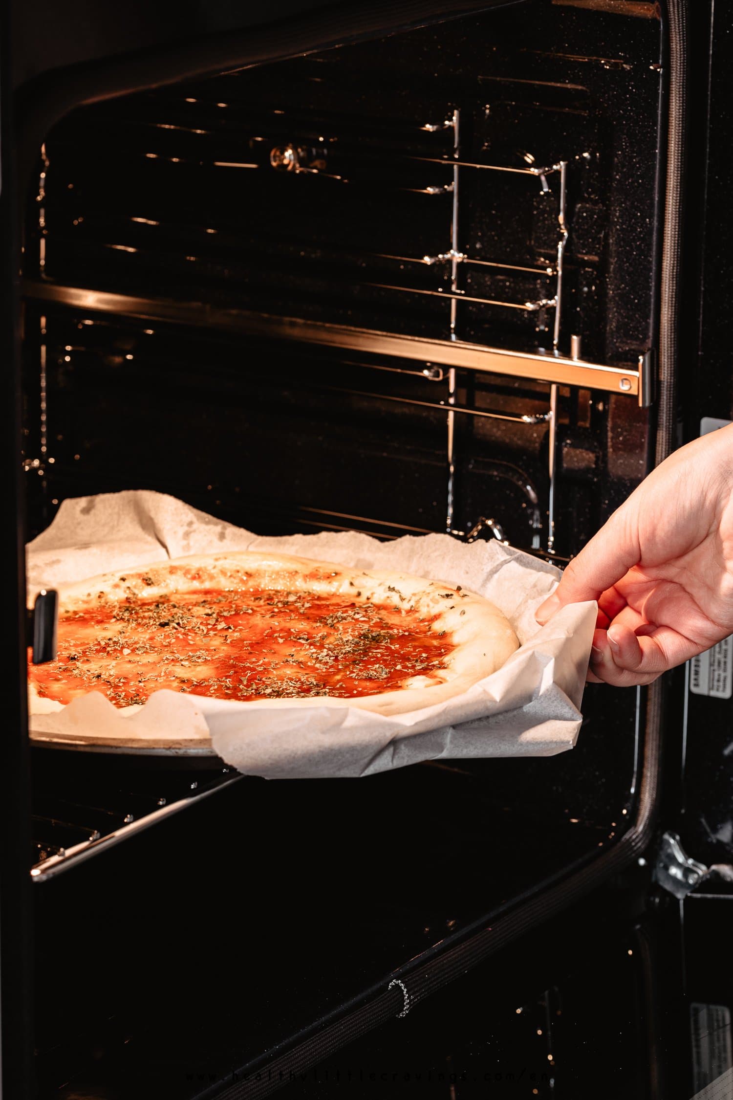 Pizza marinara ready  to be baked