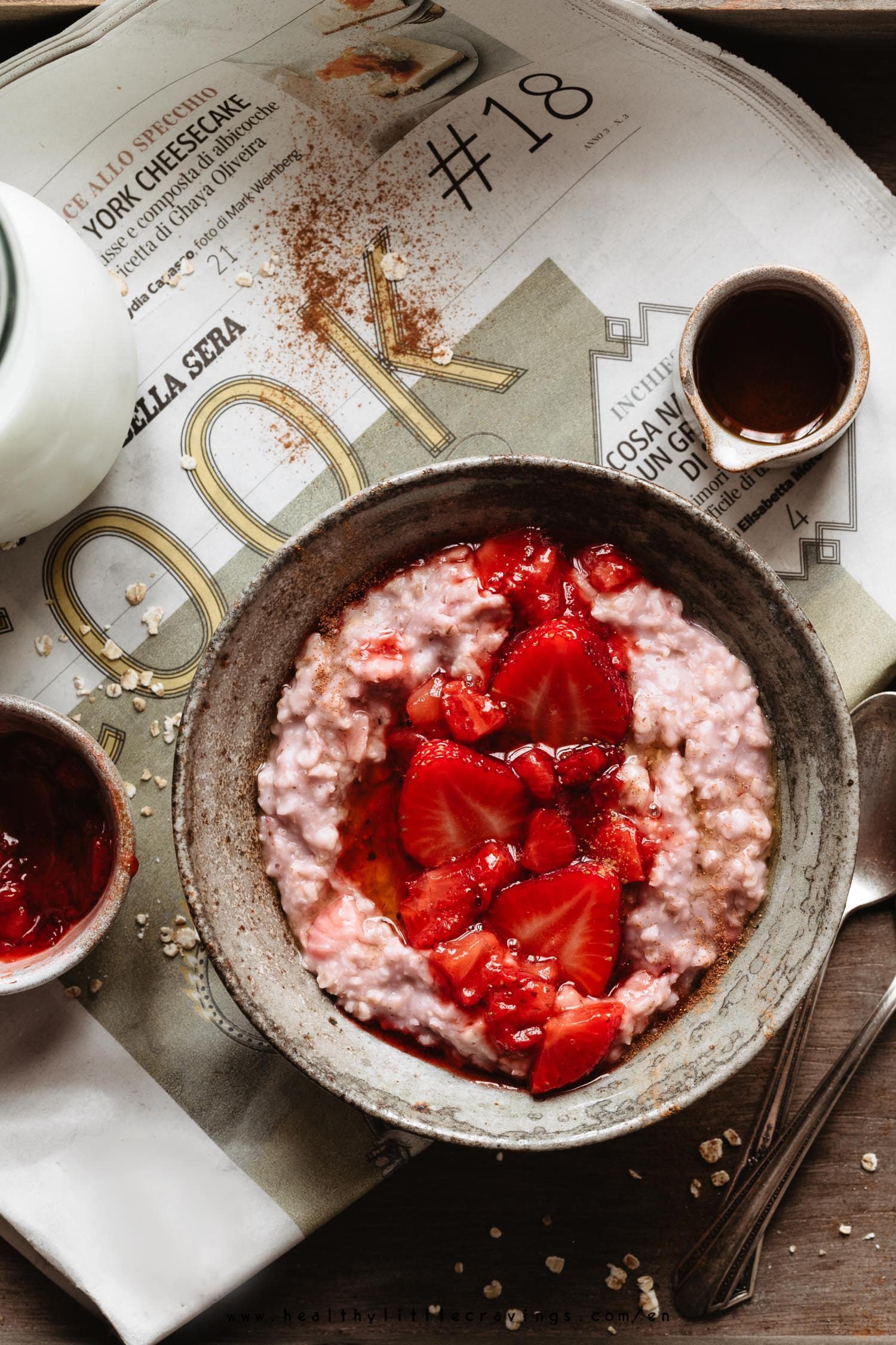 Strawberry oatmeal with maple syrup and a sprinkle of cinnamon into a bowl