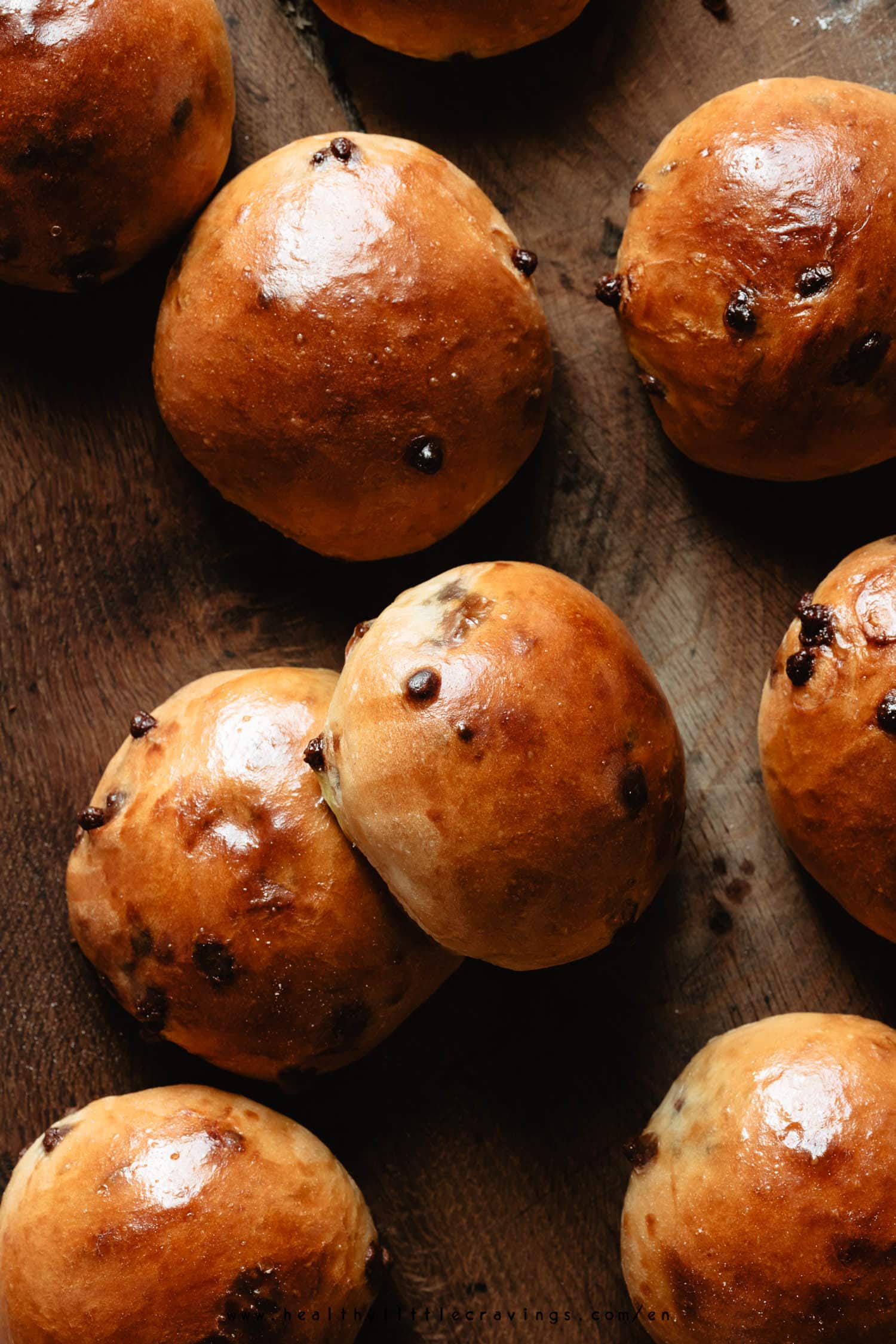 Milk buns on a wooden board