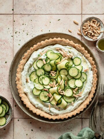 Wider view of zucchini pie with feta cheese.